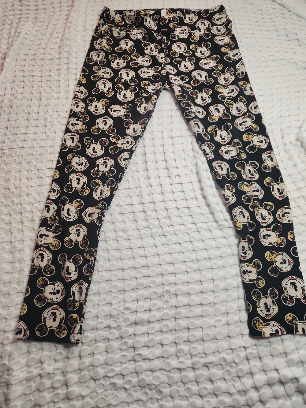 LuLaRoe Black Skinny Jeans with Cream Character Faces